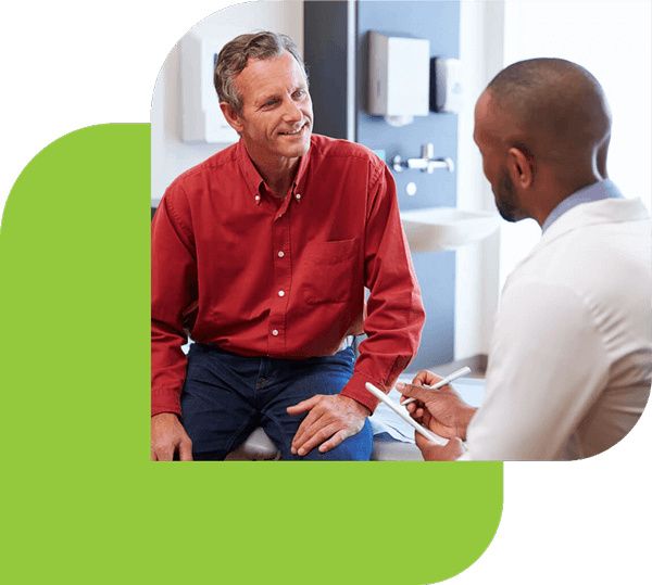 A doctor talking to their patient. The image is styled within the Revibe logo.